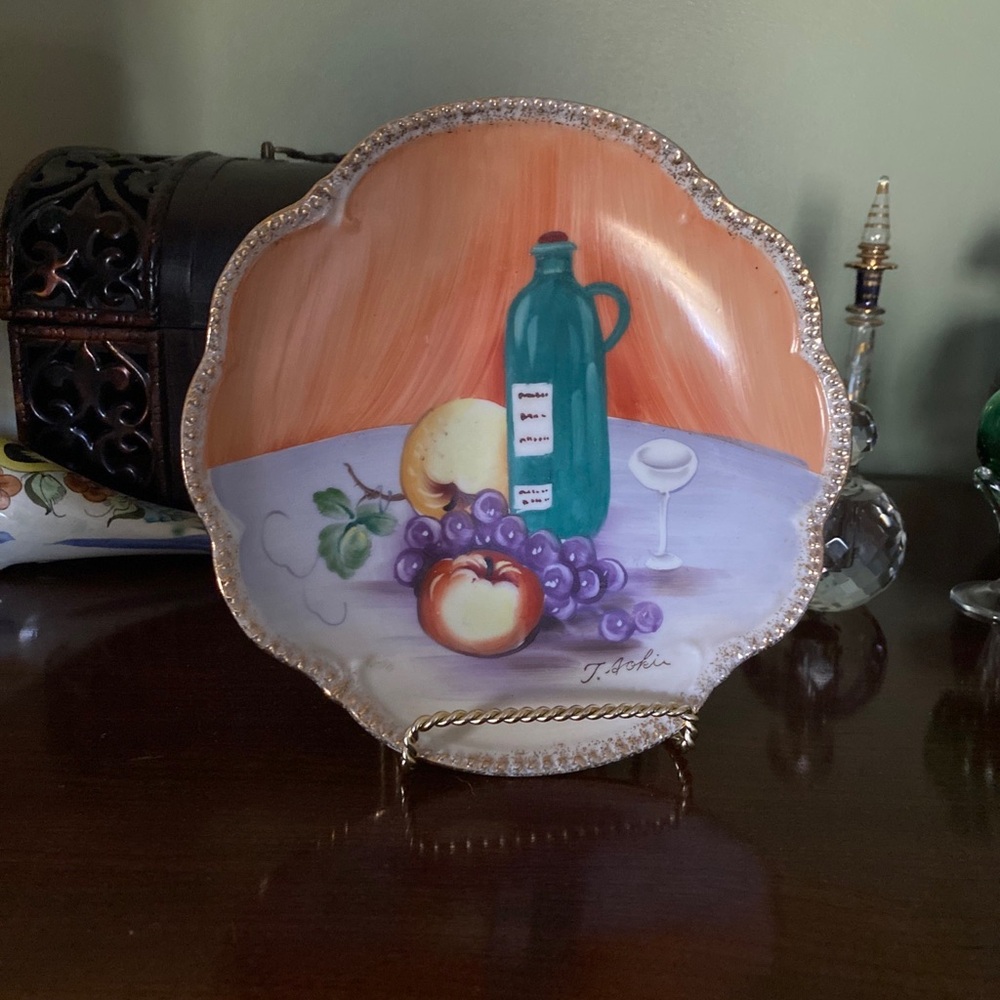 Hand-Painted Decorative Plate with Fruit and Wine Design